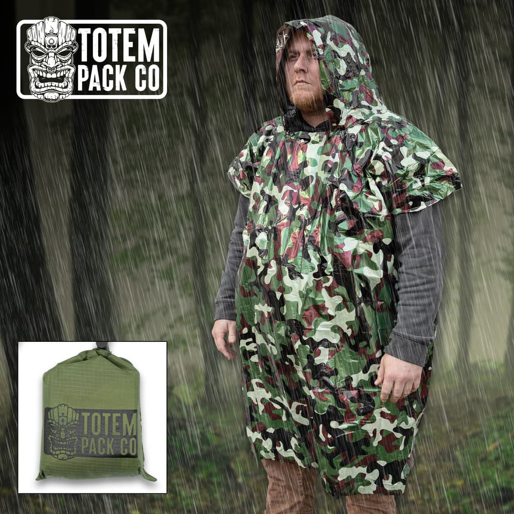 Full image of the camo Totem Pack Co. Camping Rain Poncho being worn by a person. image number 0